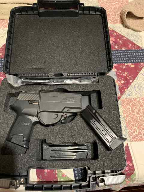 SIG. P320  9 mm 4  17 rd mags And, holster 