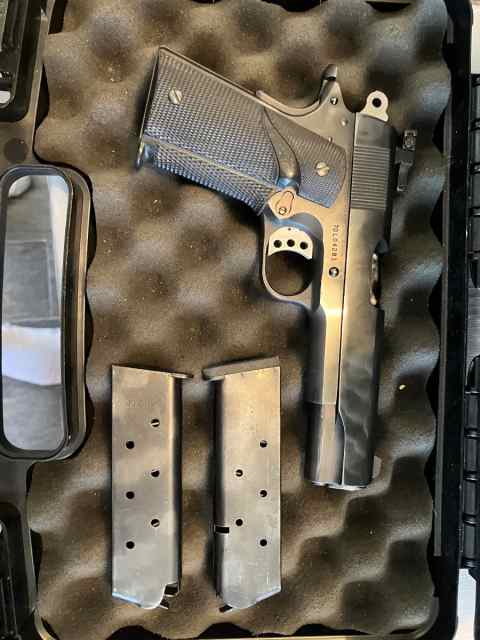 Colt 1911 frame with a Ithica slide 
