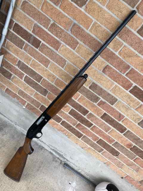 engraved Beretta Semi-Auto 20 gauge shotgun