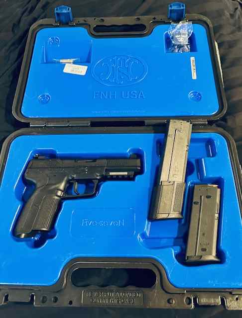 LNIB FN 5.7 Pistol 30rd mag 500 rds. ammo