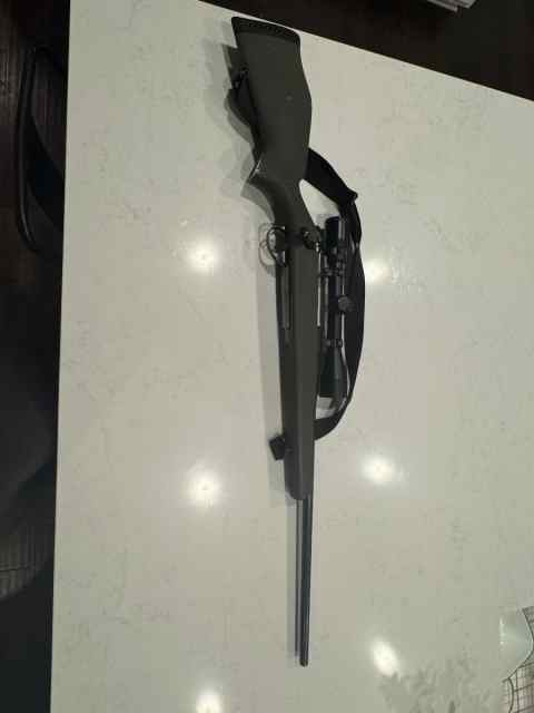 Weatherby 7mm rifle trade for bags deer corn